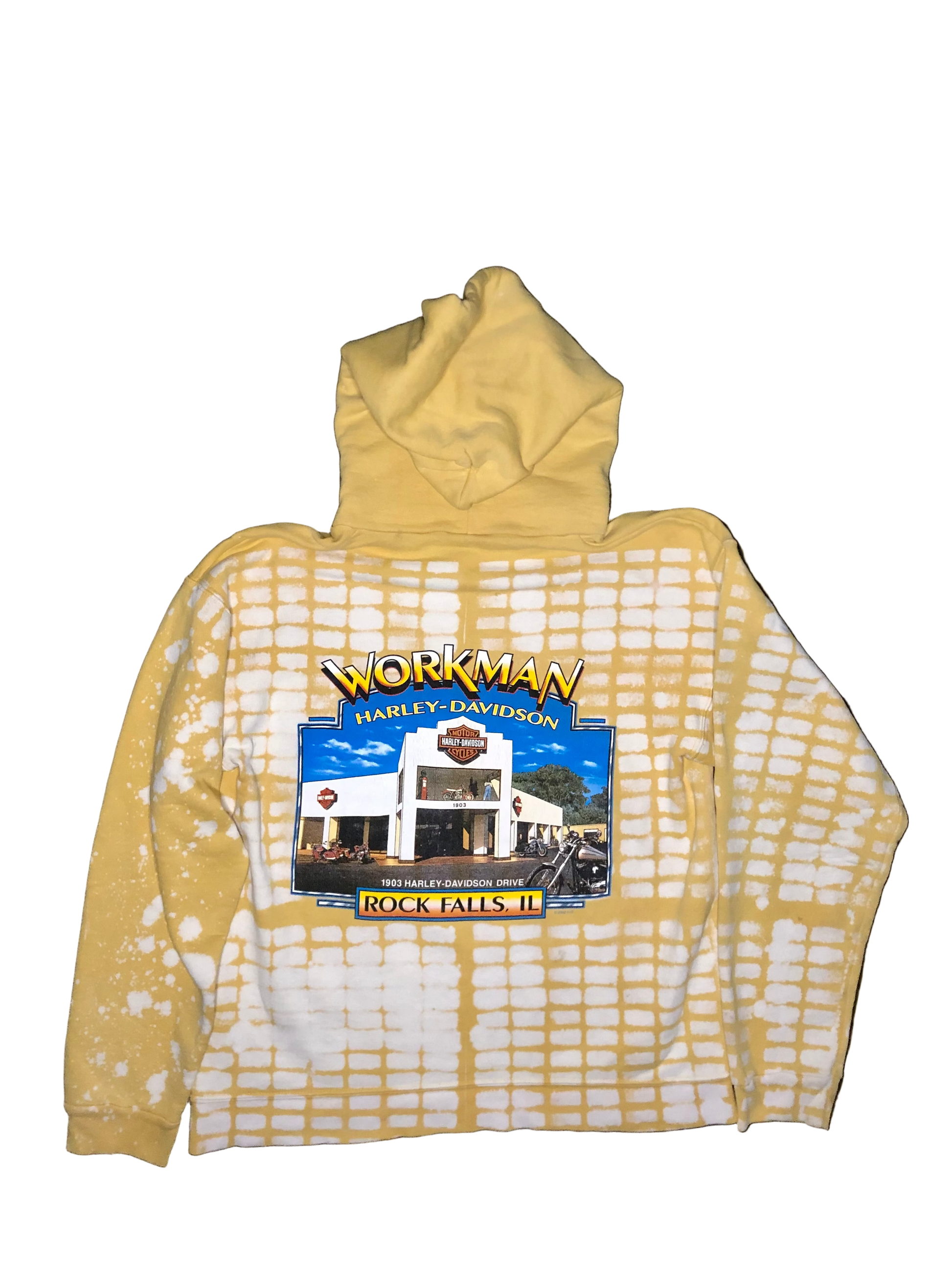 Yellow hoodie with a graphic of a building and 'Workman Harley Davidson' text on a dark background